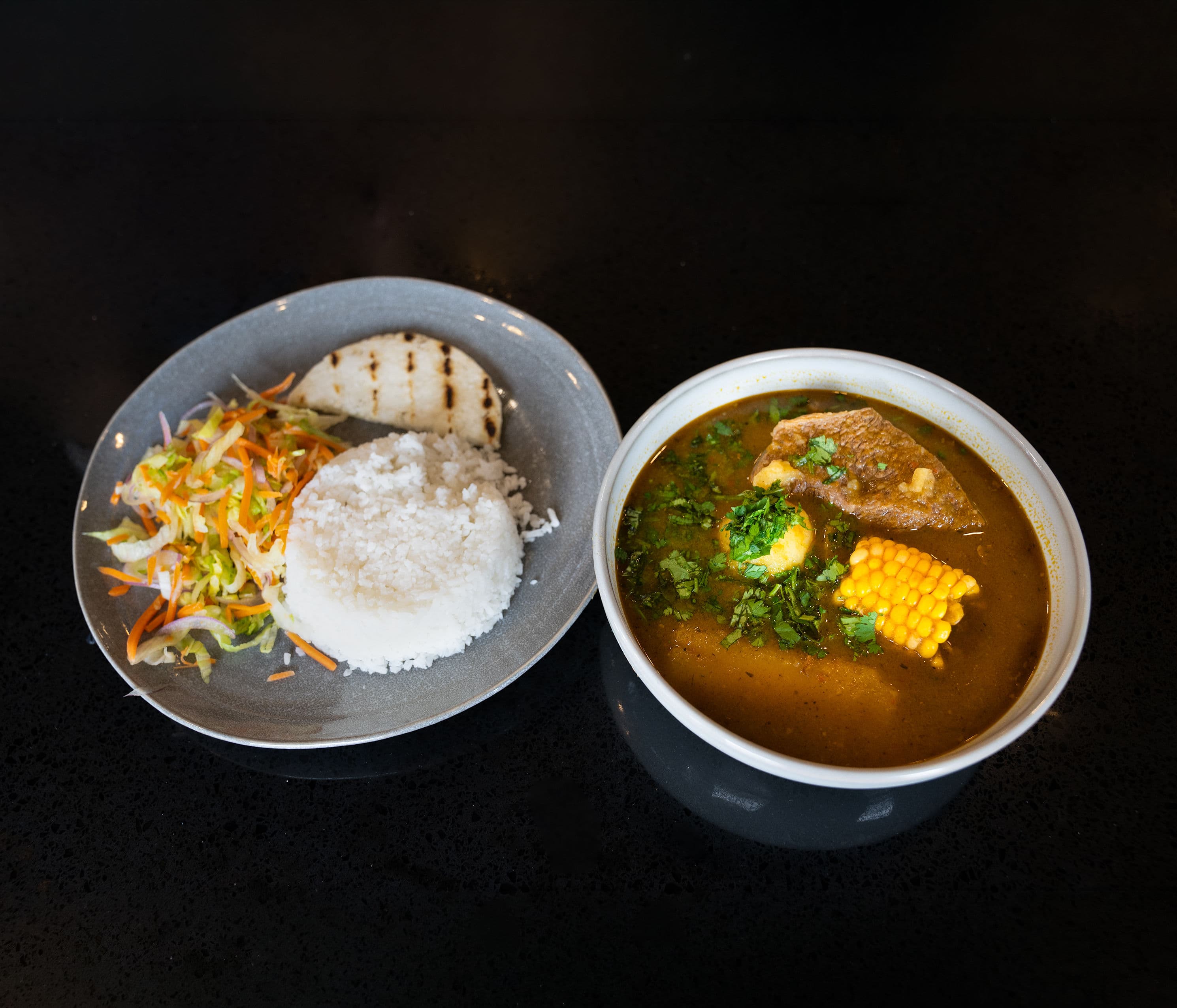 Traditional Colombian soup made with chicken, yucca, plantain, and corn.